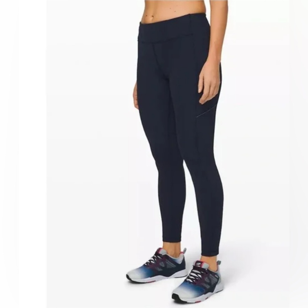 Lululemon speed tight with pockets. True navy size 4